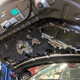 Illustration for article titled The Number of Nuts Stuffed Into This Nissan Muranos Engine Bay Is Astonishing